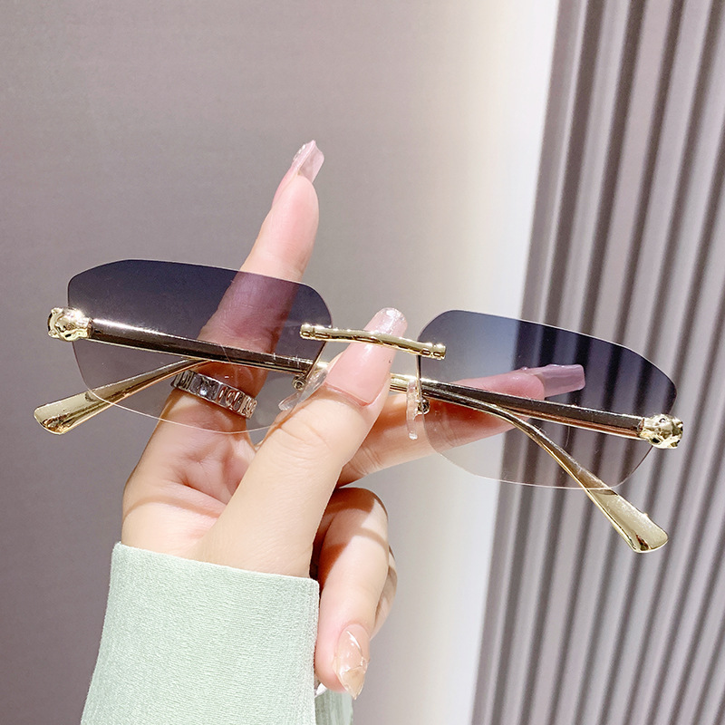 Classic Designer Sunglasses for women Metal Frameless Oval Sunglasses Rimless Metal Frame Diamond Shape Fashion Small Frame Shades Ins Eyeglasses Vint