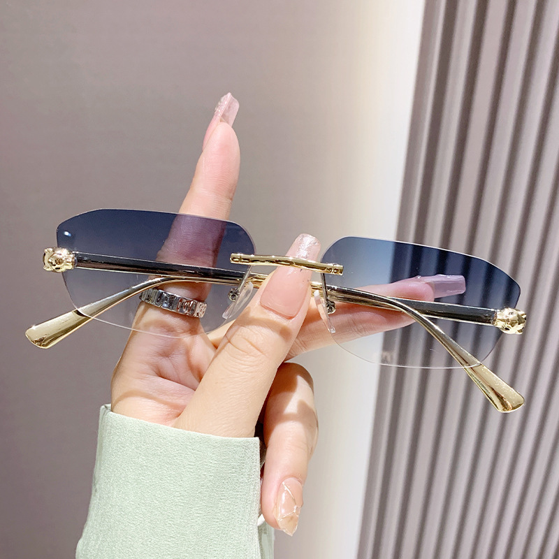 Classic Designer Sunglasses for women Metal Frameless Oval Sunglasses Rimless Metal Frame Diamond Shape Fashion Small Frame Shades Ins Eyeglasses Vint