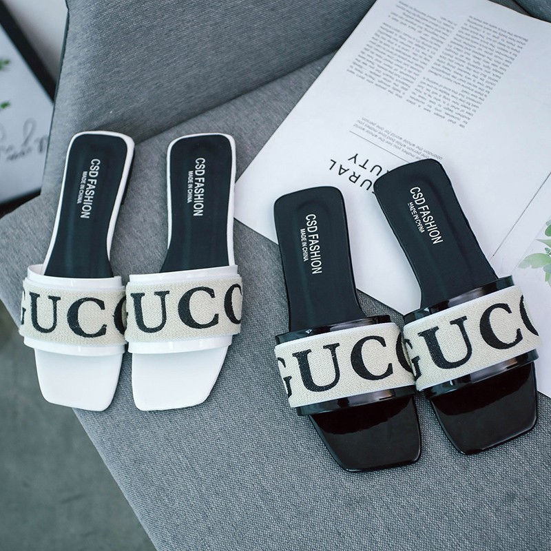 Free shipping designer women's summer Korean-style flat flip-flops with a single letter are popular, durable and casual beach sandals