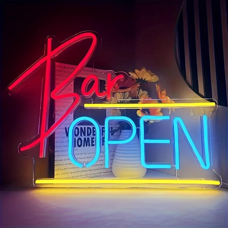 Open Door Neon Sign. Dimmable LED, bright and highly visible "We're Open" neon sign. Equipped with an on/off switch. Suitable for comme