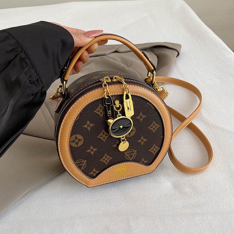 2025 New Arrival Elegant Women's Round Bag Fashion Versatile Crossbody Shoulder Bag Stylish Party bag hot sale Yellowish-brown coffee Off-white