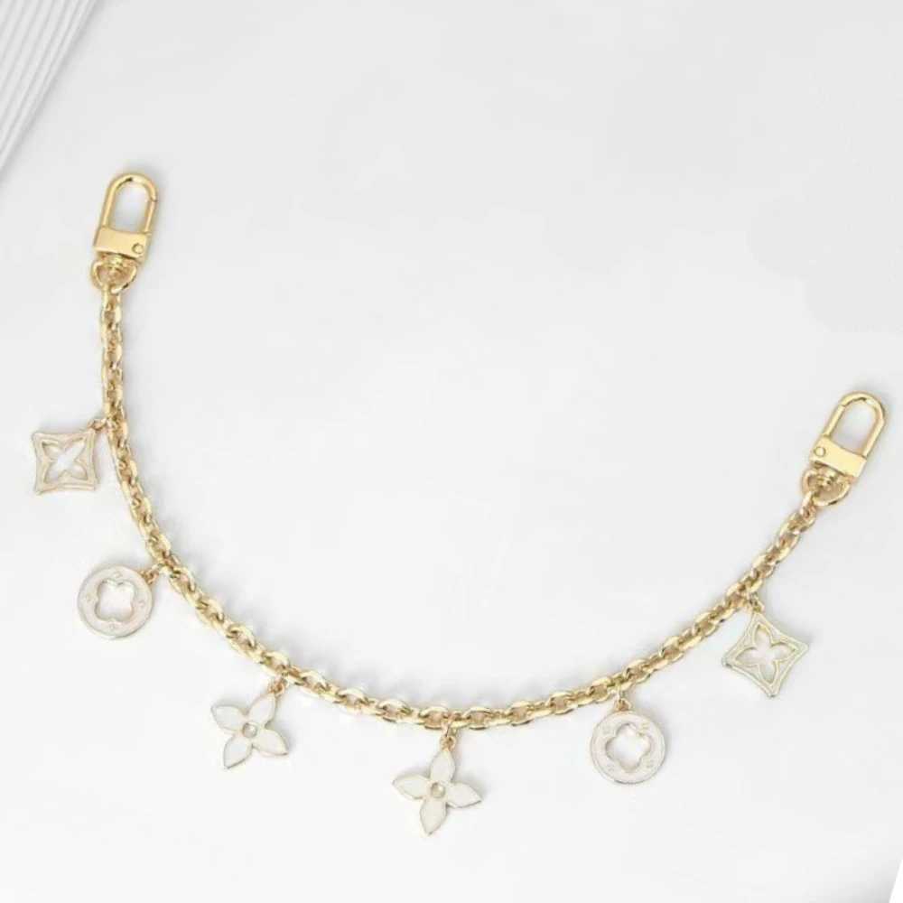 New cute little fragrant style bag with hanging chain decoration chain metal strap black and white strapT251127