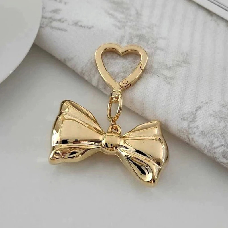 Punk Gold Silver Color Bowknot Keychain for Women Smooth Metal Heart Love Buckle Bow Pendant Bag Decoration Accessories 251124