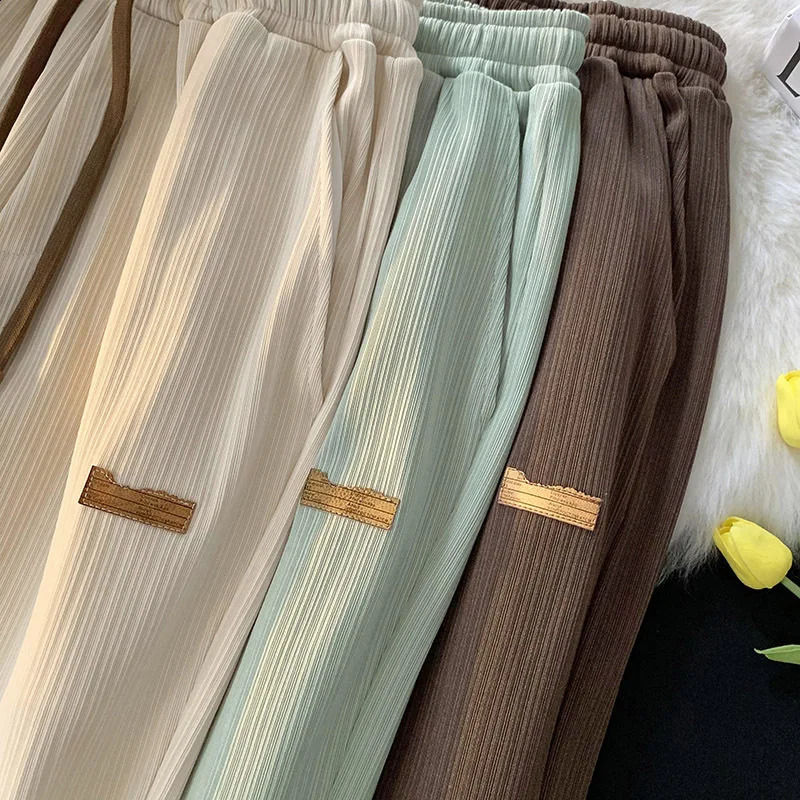 High end silk straight leg mens pants with thin touch in summer casual and loose bottom suitable for casual travelers fashion 250427