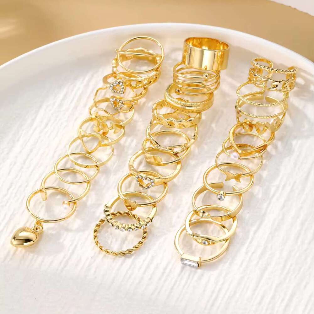 Designer Jewellery High Quality Gold Heart Leaves Pearls Stacking Ring Collection with Crystals for Daily Wear and Gifting Occasions Textured Fashion 