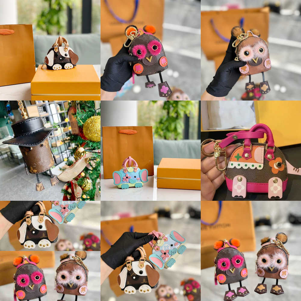 Women Luxury Key Brand Wallets Designer Dog Elephant Shell Coin Purses Keychain Cute Owl Mini Backpack Ladies Zipper Card Bags Clutch Bag Totes Pendants Charms 0GJC