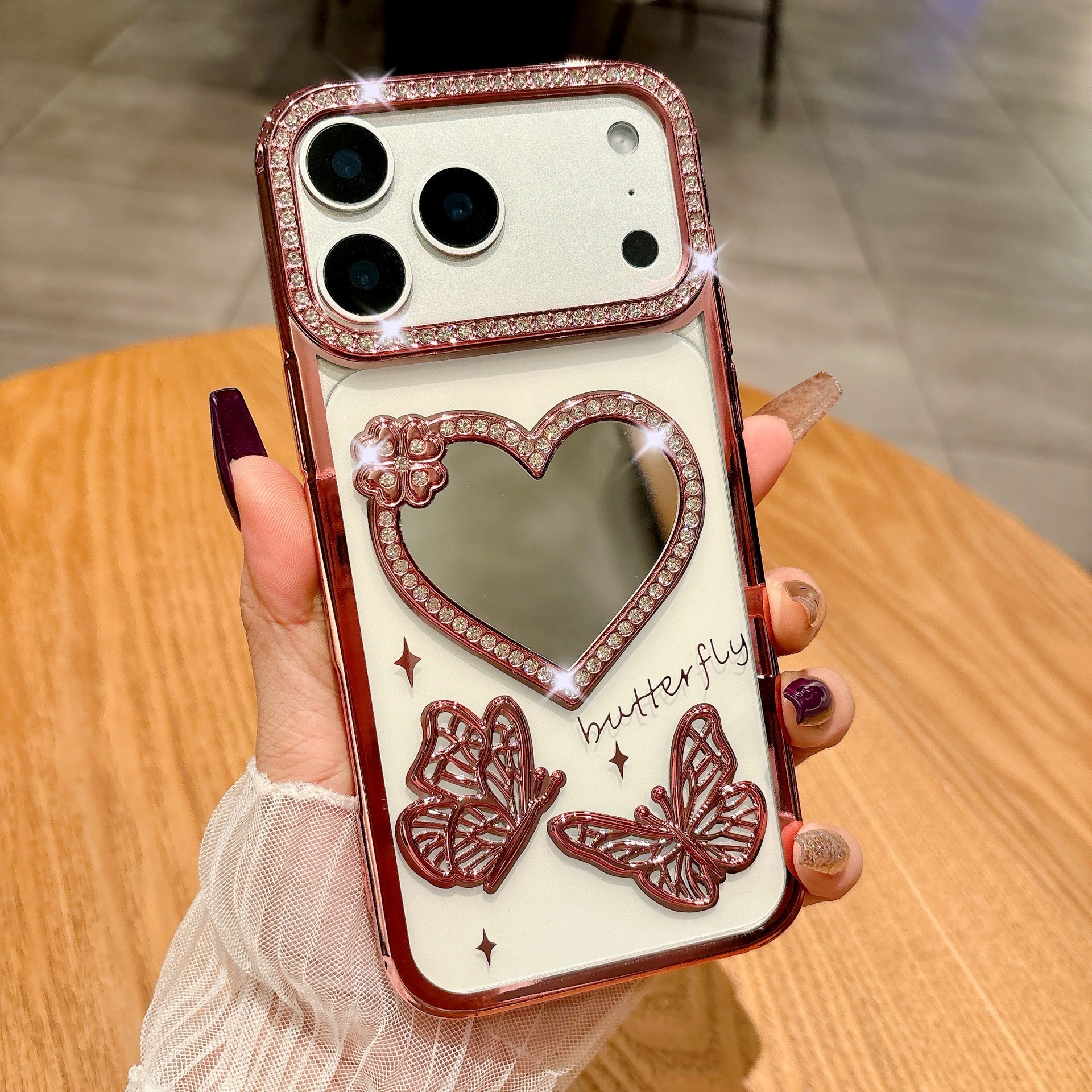 Electroplated Rhinestone Heart Mirror Butterfly Phone Case iPhone 17 Pro Max Compatible with Apple 16/15 Pro Soft Case