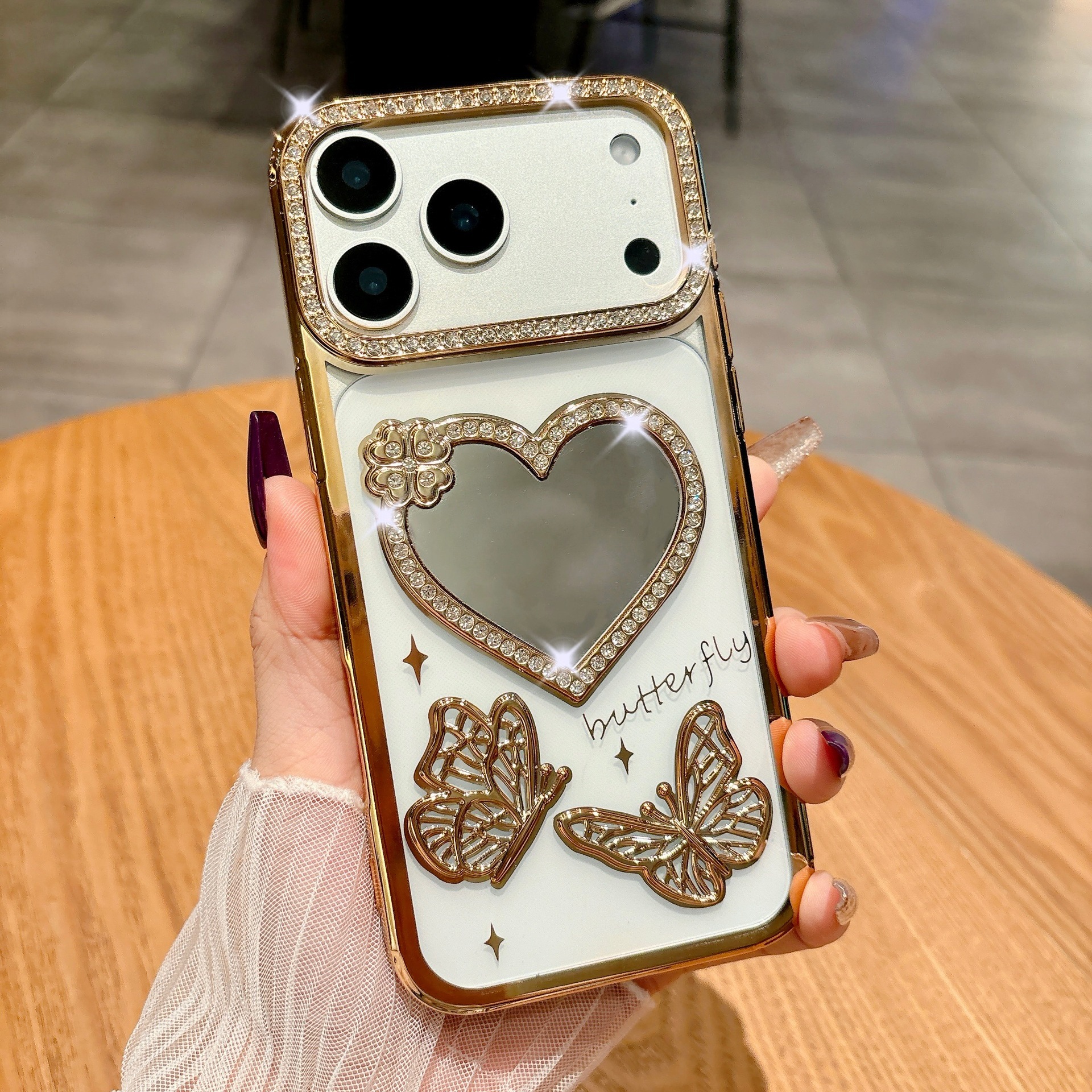 Electroplated Rhinestone Heart Mirror Butterfly Phone Case iPhone 17 Pro Max Compatible with Apple 16/15 Pro Soft Case