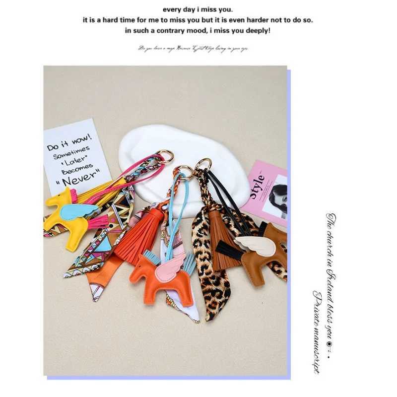 Designer womens bags American fashion small Pegasus pendant high-end silk scarf PU leather fringed bag pendant car keychainT251127