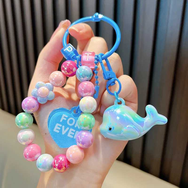 Acrylic plating small dolphin key chain pendant small fresh colored beaded gift bags for loversT251127