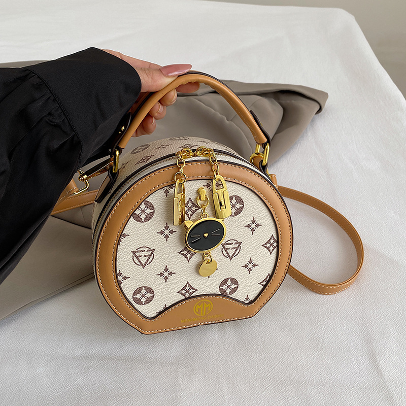 2025 New Arrival Elegant Women's Round Bag Fashion Versatile Crossbody Shoulder Bag Stylish Party bag hot sale Yellowish-brown coffee Off-white