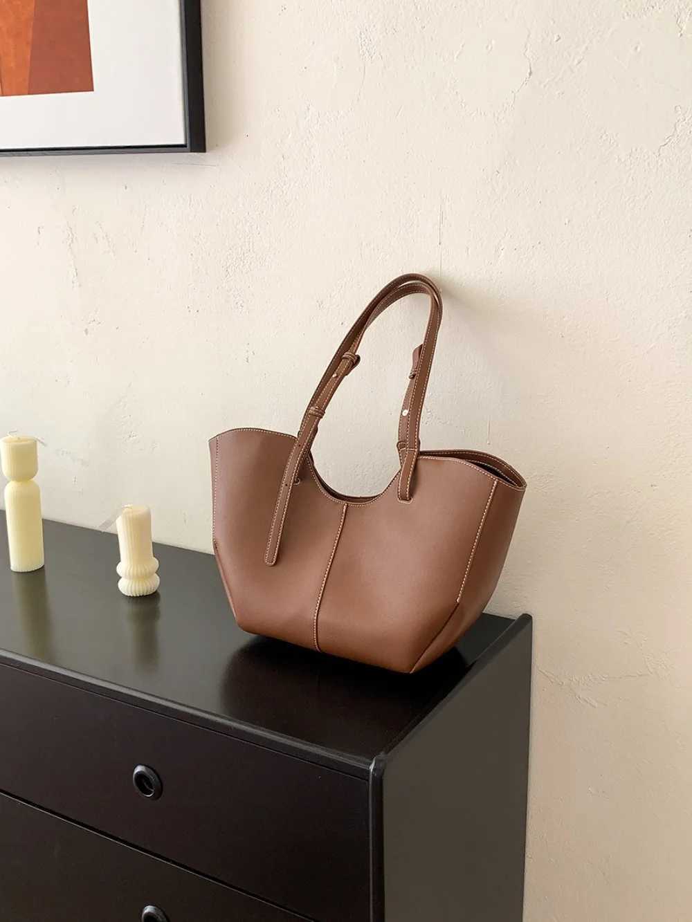 High quality multifunctional wing PU solid color large capacity daily commuting bag K251128