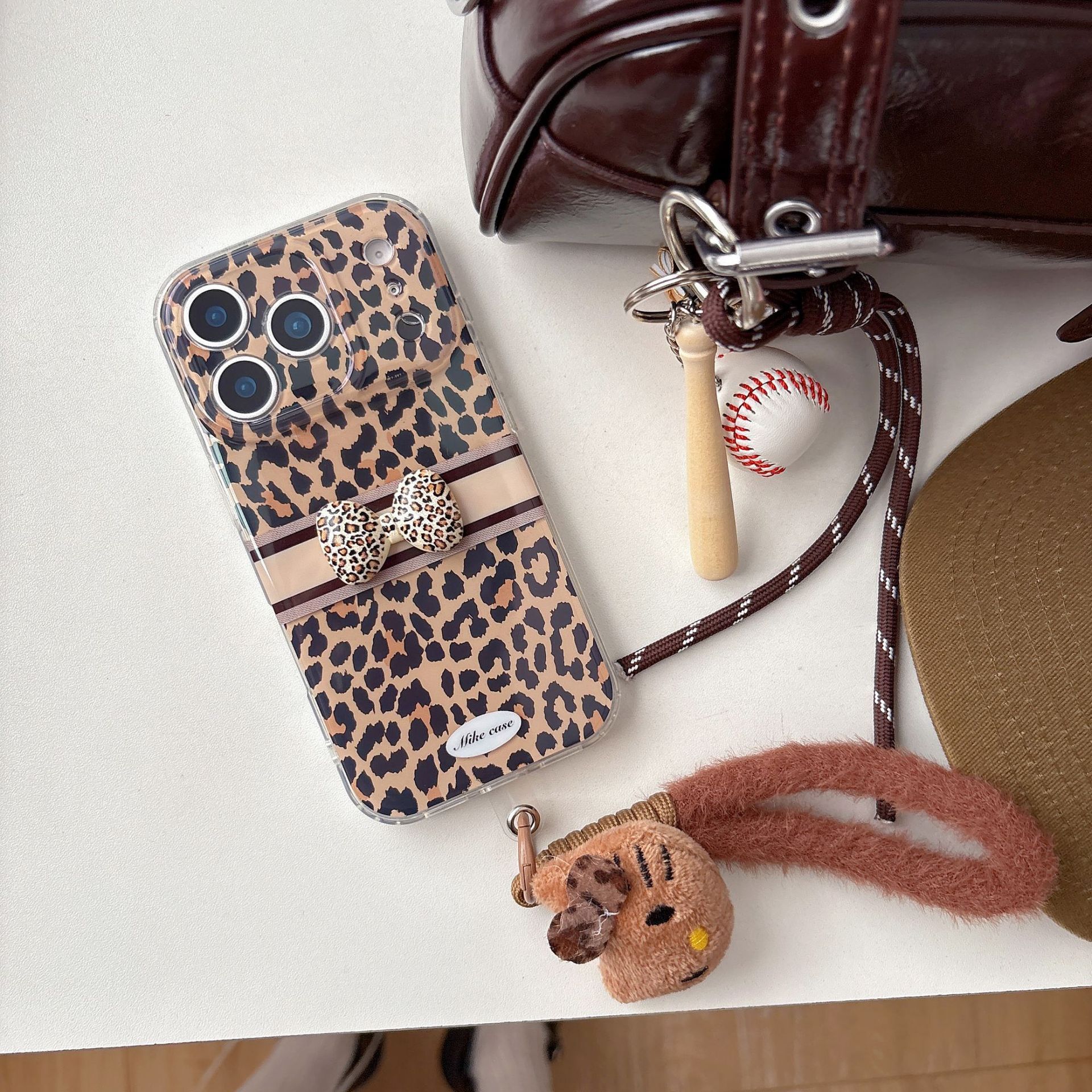 Leopard Print Bow Phone Case iPhone 17 Pro Max Compatible with Apple 16/15 Doll Lanyard Protective Case