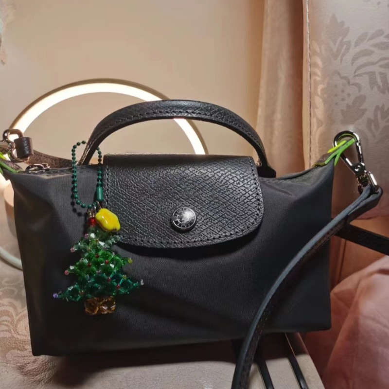Designer 2025S women dragon dumpling new mini short handle handbag shoulder crossbody mobile phone change makeup bag