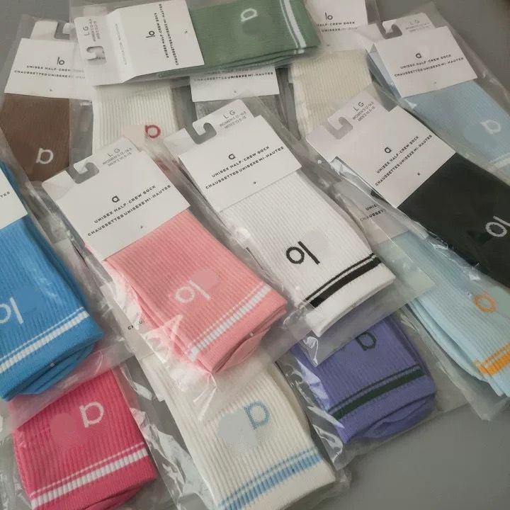 Yoga socks 5a sports socks designer Wholesale of new yoga towel soles mid-calf men's and women's socks lettered trendy socks running cotton socks