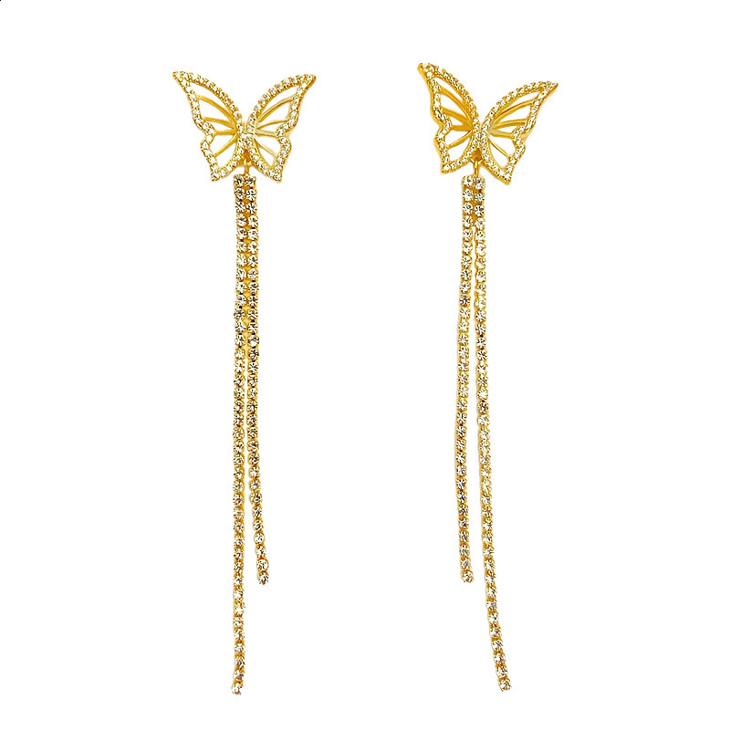 woman with long copper-set zircon earrings that exude a European and American fashion style 231208