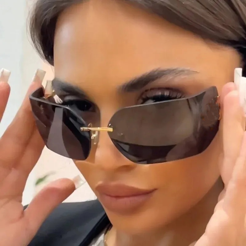 2025 Designer Sunglasses Women Frameless Polarized Sunglass 54ymu Curved Lens street style MU cat eye sunglasses Uv400 Protect Lenses Aesthetic Eye Glasses