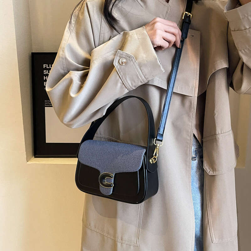 Women' new design, light luxury Korean version, personalized splicing, contrasting color underarm bag, handbag