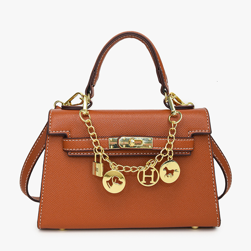 Designer 2025Sbag women new simple and fashionable handbag crossbody lock Kelly mother bag