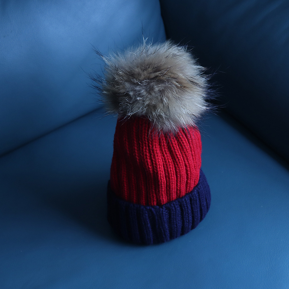 Knitted two-color woolen hat for autumn and winter warmth, rolled edge hat, Korean version two-color women's raccoon ball knitted hat