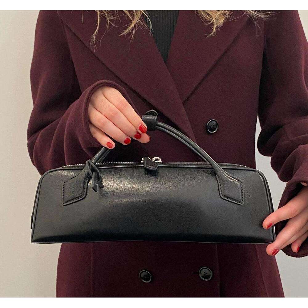 higher quality alaiabag Le Teckel Bags Leather Shoulder Bag Women Handbags Fashion Baguette Bag Armpit Bag Long Profile Double Zipper Opening Closing Design tr