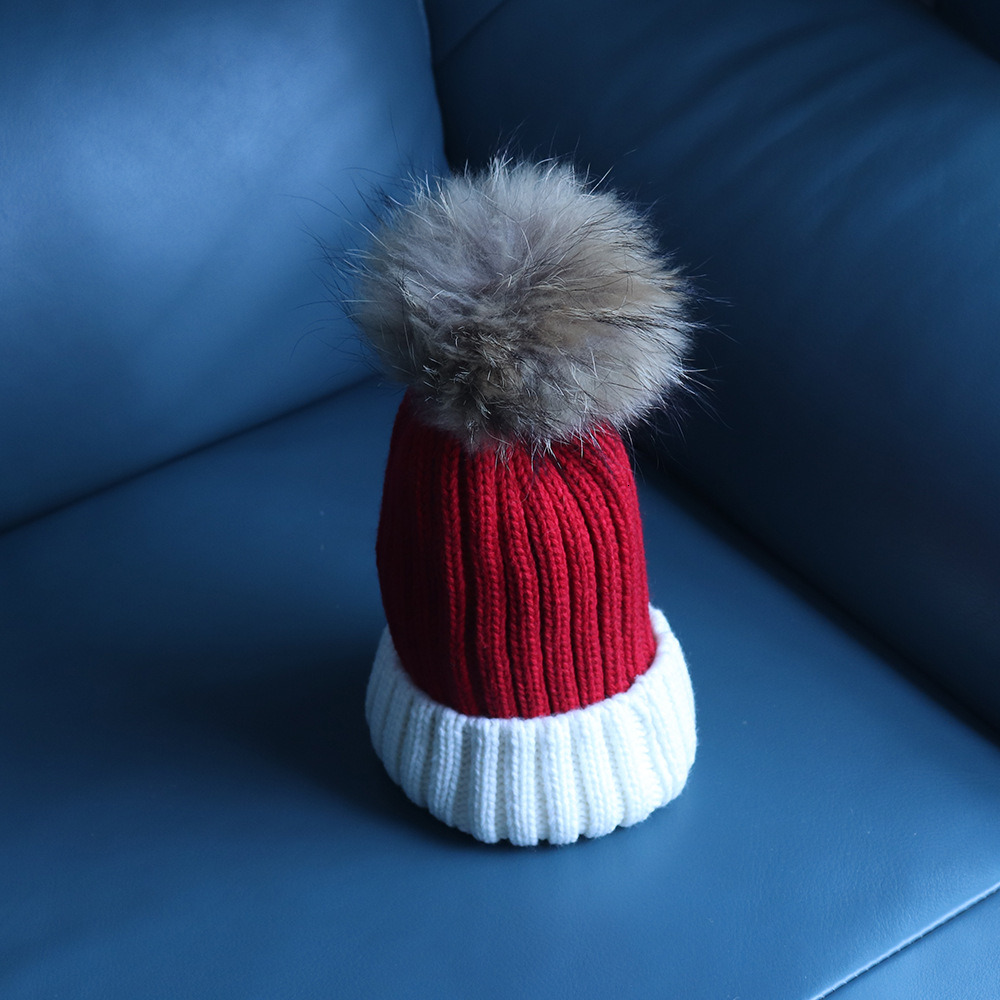 Knitted two-color woolen hat for autumn and winter warmth, rolled edge hat, Korean version two-color women's raccoon ball knitted hat