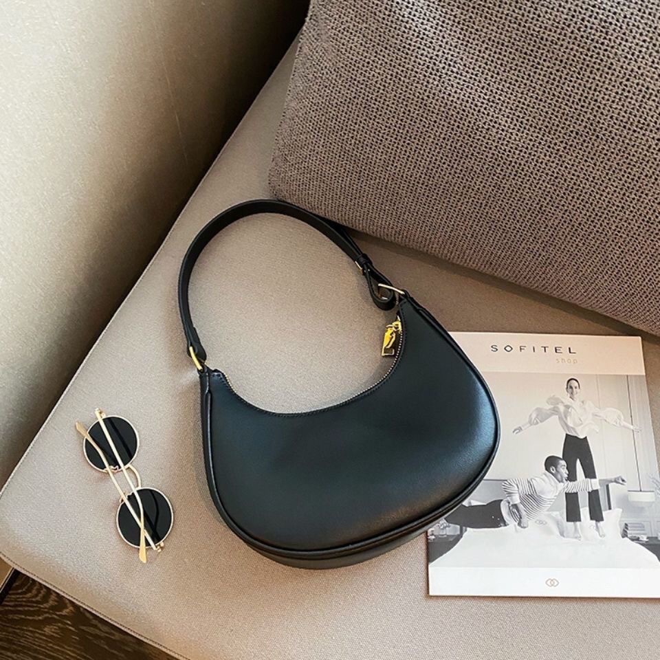 Free shipping 2025 new designer women's underarm bag, single shoulder, handheld, niche design, crescent shaped women's bag, high top