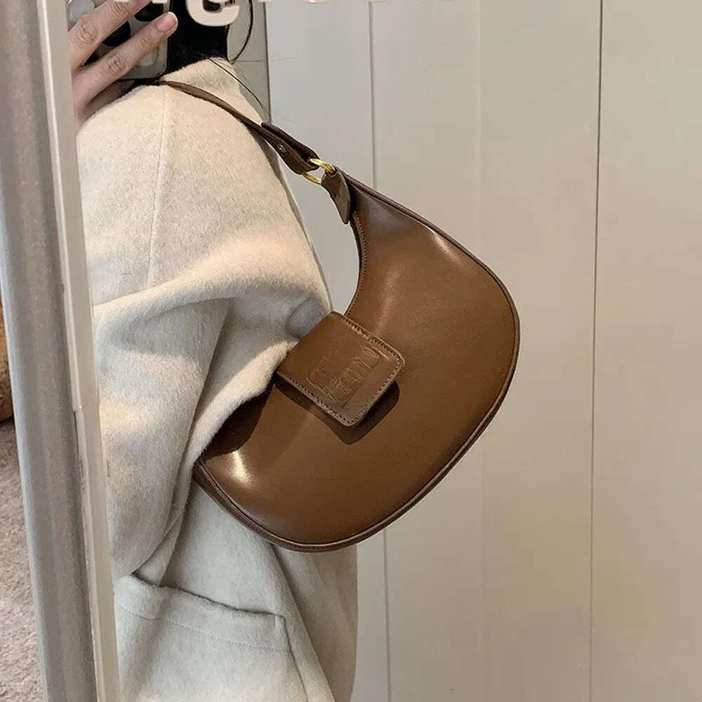 Designer 2025 Shoulder High Quality Women's handbag Purse Leather Metal badge Hobo Crossbody Black Classic Underarm Bag Shopping bag