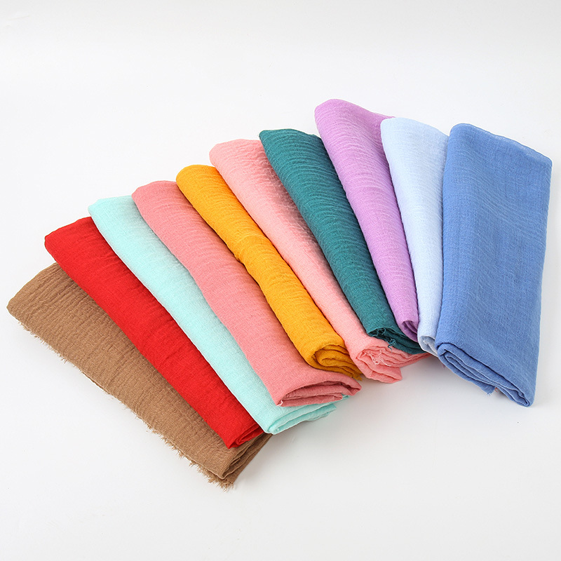 K545 Foreign trade hot sale new style simple solid color wrinkled cotton and linen scarf winter hot sale soft skin-friendly warm neck scarf for women
