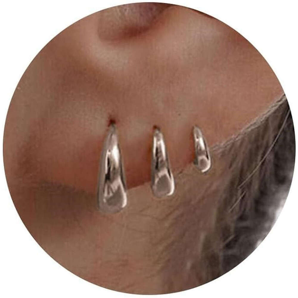 chic unisex jewelry collection featuring golden copper accents matching hoop earspools finger ornaments