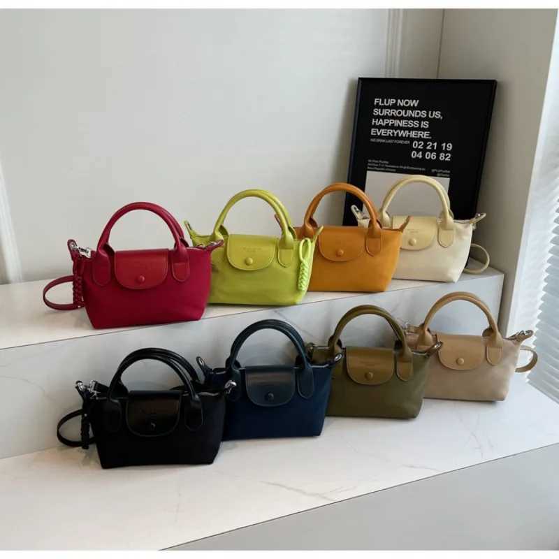Fashionable simple elegant large capacity soft handbag one shoulder diagonal cross bag bulk bag womens bagW250429
