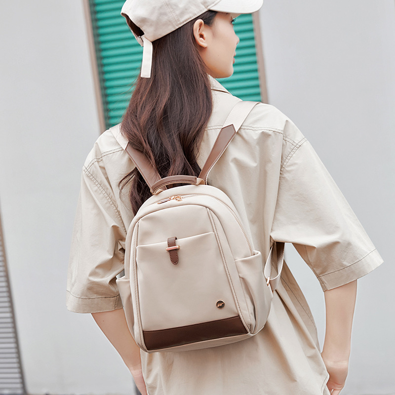 2025 New Designer Bag Winner's New Nylon Backpack With Small Capacity Commuting, Work, Travel, And High-End Feel For Women