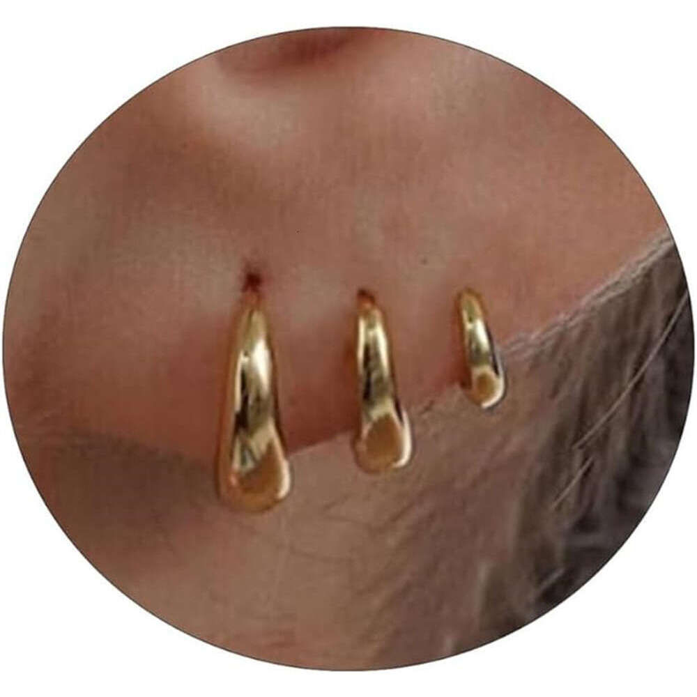 chic unisex jewelry collection featuring golden copper accents matching hoop earspools finger ornaments
