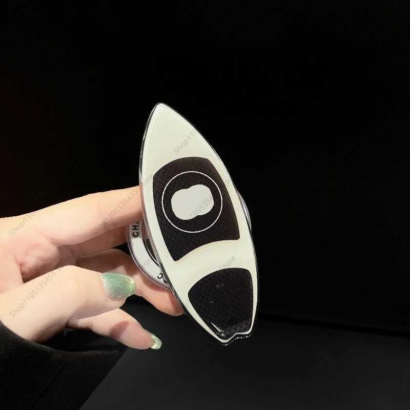 NEW Light Luxury High-end Strong Magnetic Mobile Phone Stand Holder Trend For Phone Bracket Classic Fashion Phone Grip Y251129