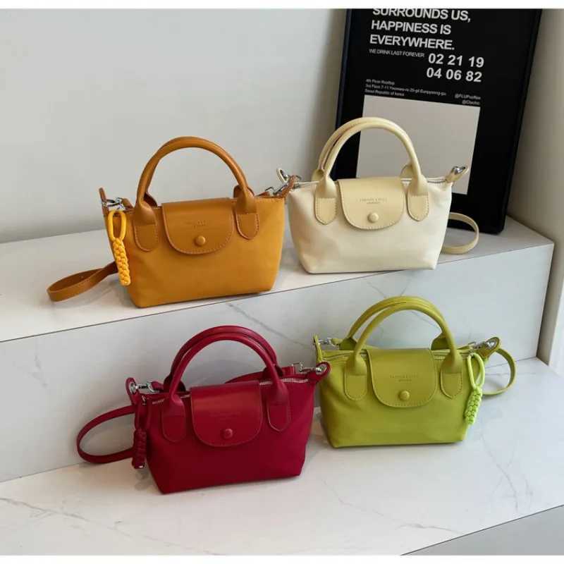 Fashionable simple elegant large capacity soft handbag one shoulder diagonal cross bag bulk bag womens bagW250429
