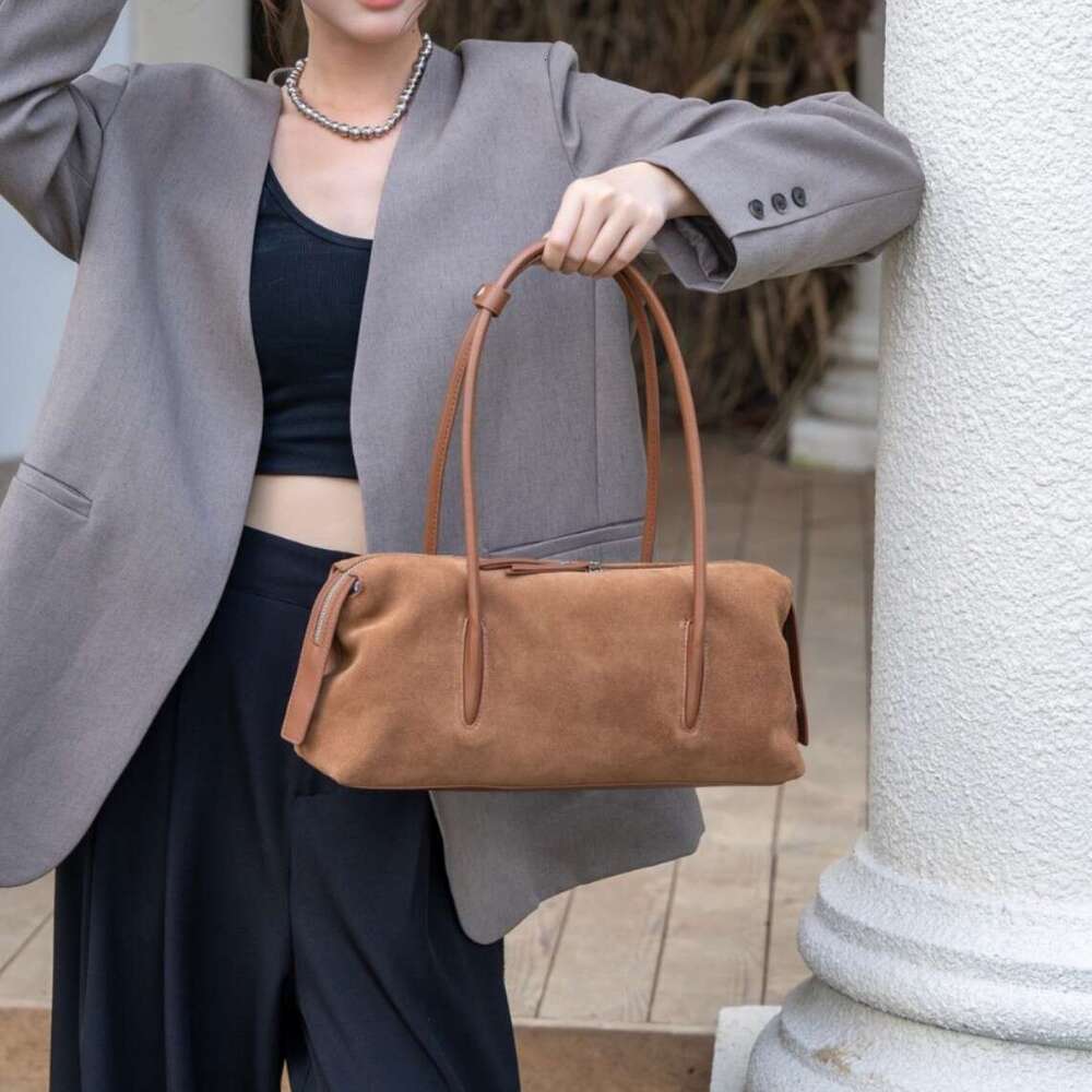 Hot Sale Chic Tassel Design Women Armpit Shoulder Bag Caramel Coffee Color High-end Suede Cow Leather Women Handbag Winter
