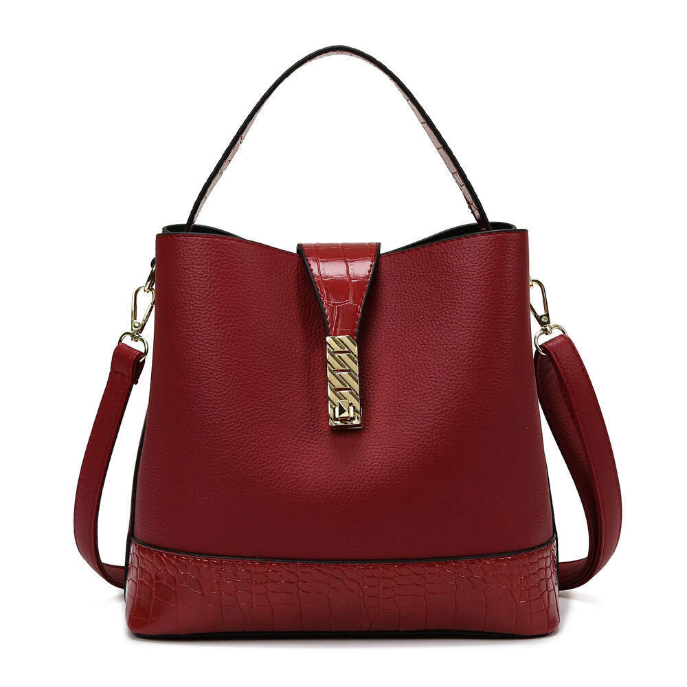 New spring and summer hand-held bucket for women, soft leather broadband crossbody bag, Korean version popular fashion single shoulder women's ba