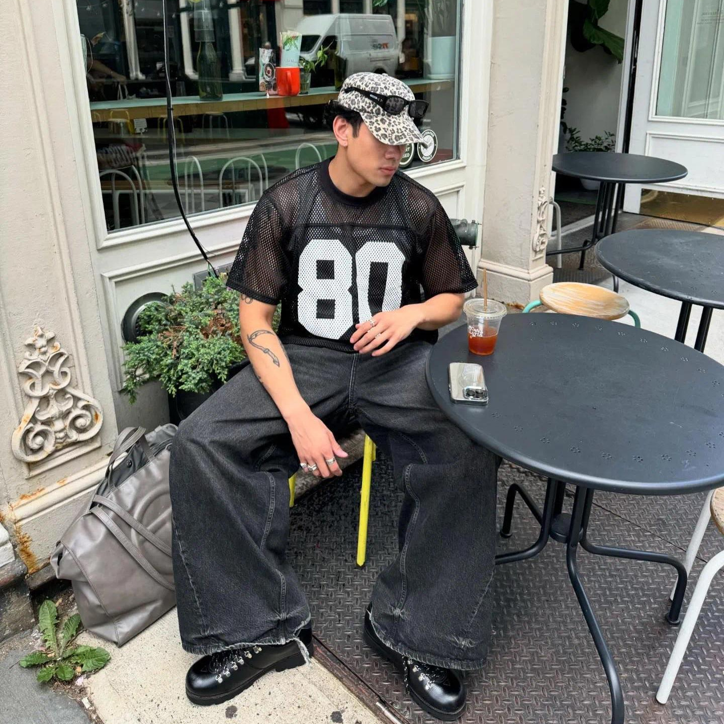 The 2025 New Retro Perforated Mesh Rugby Suit With Digital And Letter Prints For Men And Women Features A Casual Short-sleeved Design