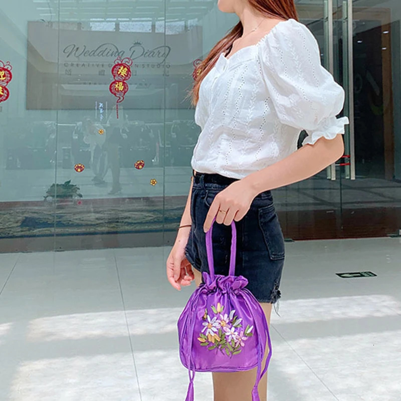 Womens handbag womens handbag mobile phone bag summer small wallet national style embroidered pattern drawstring bag 250427