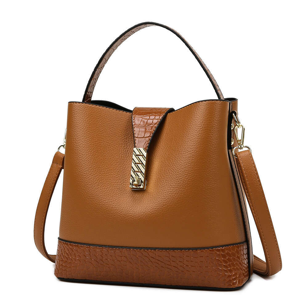 New spring and summer hand-held bucket for women, soft leather broadband crossbody bag, Korean version popular fashion single shoulder women's ba