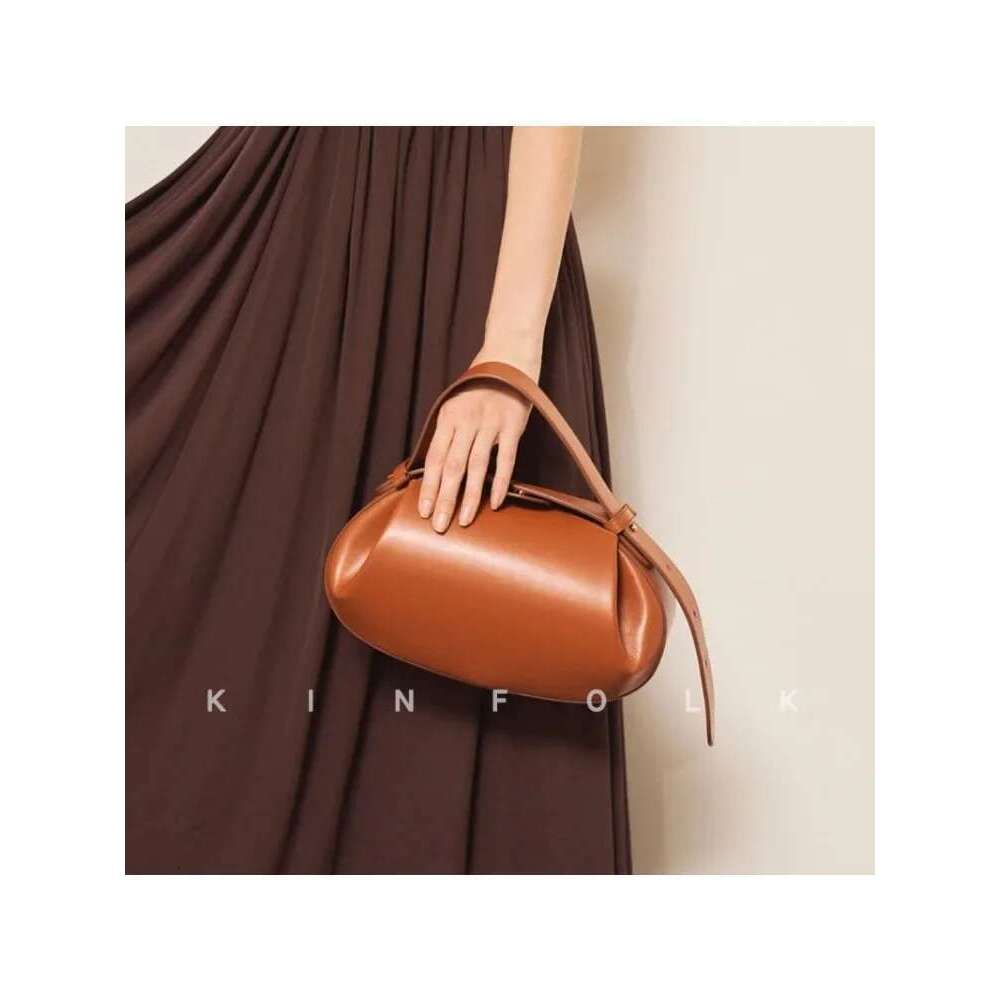 Niche popular crossbody three-dimensional women's armpit small round baguette bag, hand-held bag