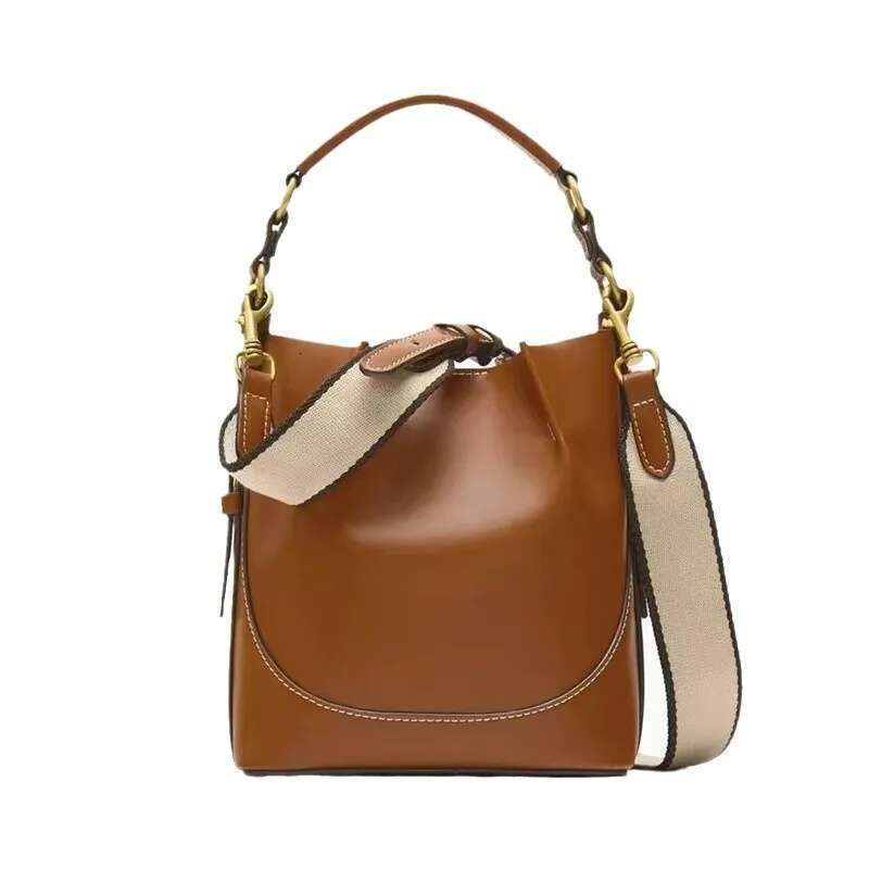 2025 New Fashion Women's Brown Korean Version Of Portable Slung Broadband Beam Mouth Bucket Bag