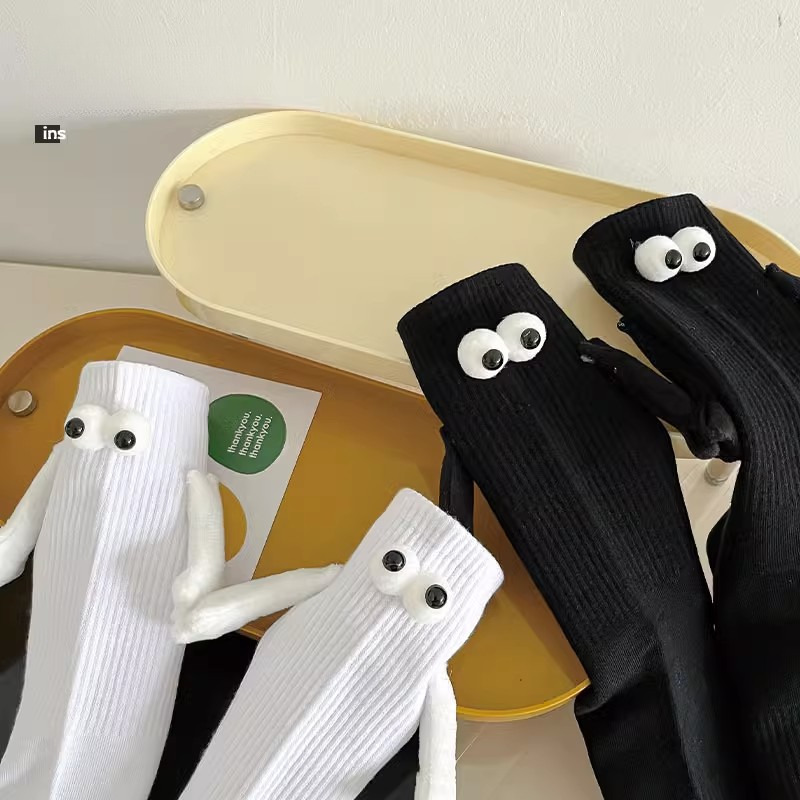 Couple holding hands Tiktok net red magnetic suction stereo eye tube socks cotton personality funny black and white stockings