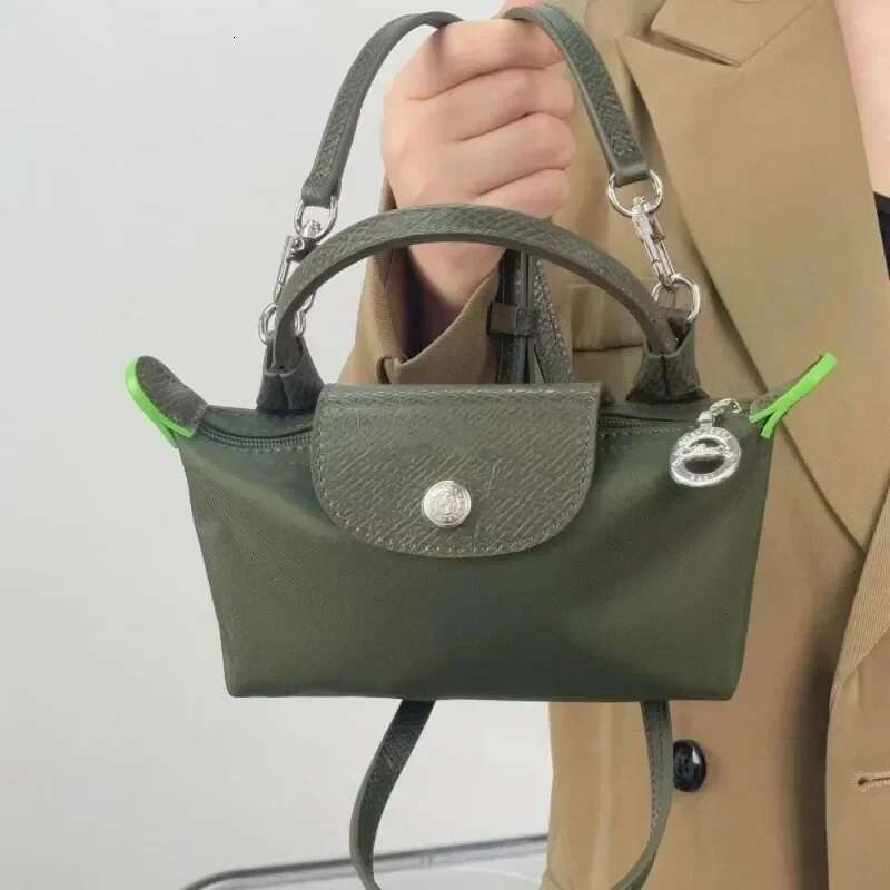High Quality French Mini Dumpling Made Of Nylon With No Perforation Womens Zero Handbag Single Slanted Shoulder Bag
