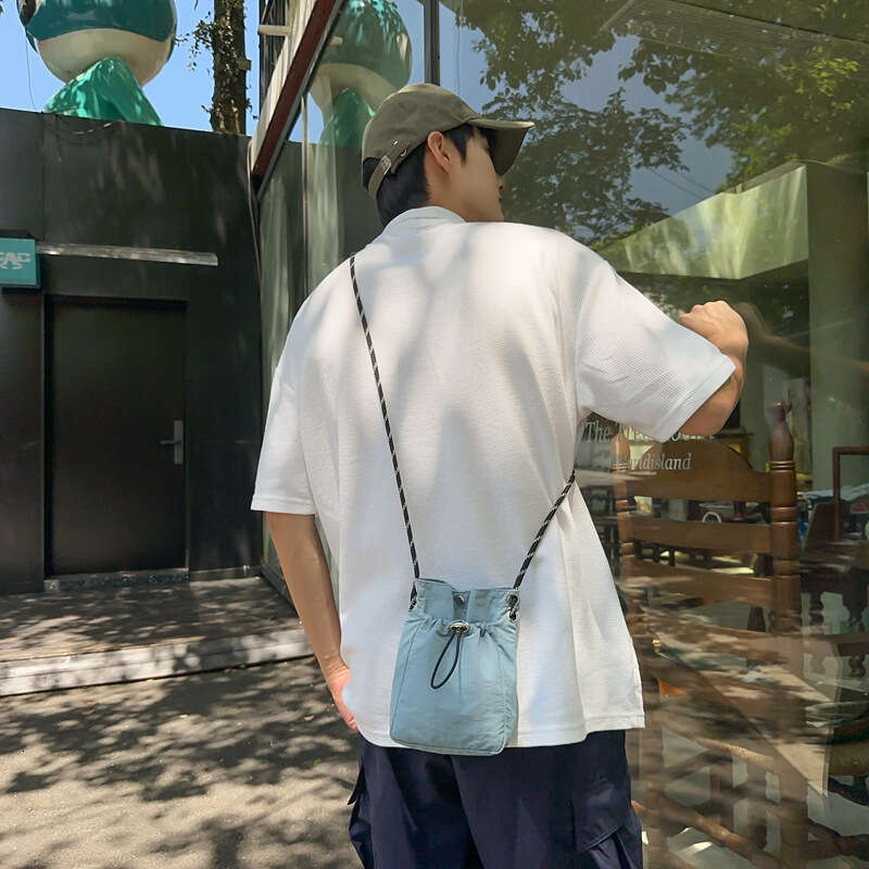Extremely simple style mobile phone bag for women in Japan and South Korea, lightweight drawstring canvas small bag, versatile mini single shoulder di