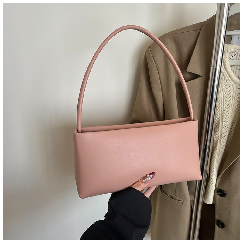 Trendsetting Diagonal Carryall Tote by Contemporary Designer Compact Yet Spacious Arm Pit Sling