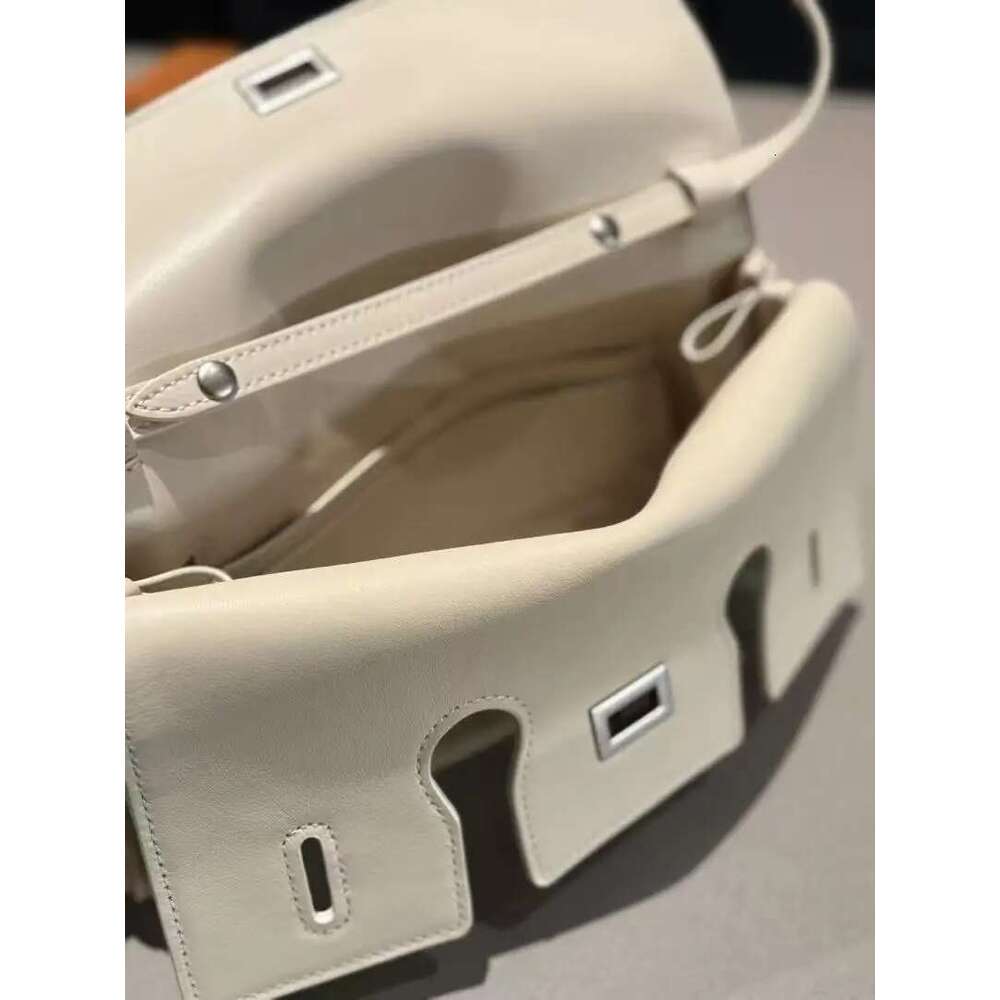 Genuine leather handbag 2025 new niche design lock small square vintage motorcycle style cowhide one-shoulder crossbody bag