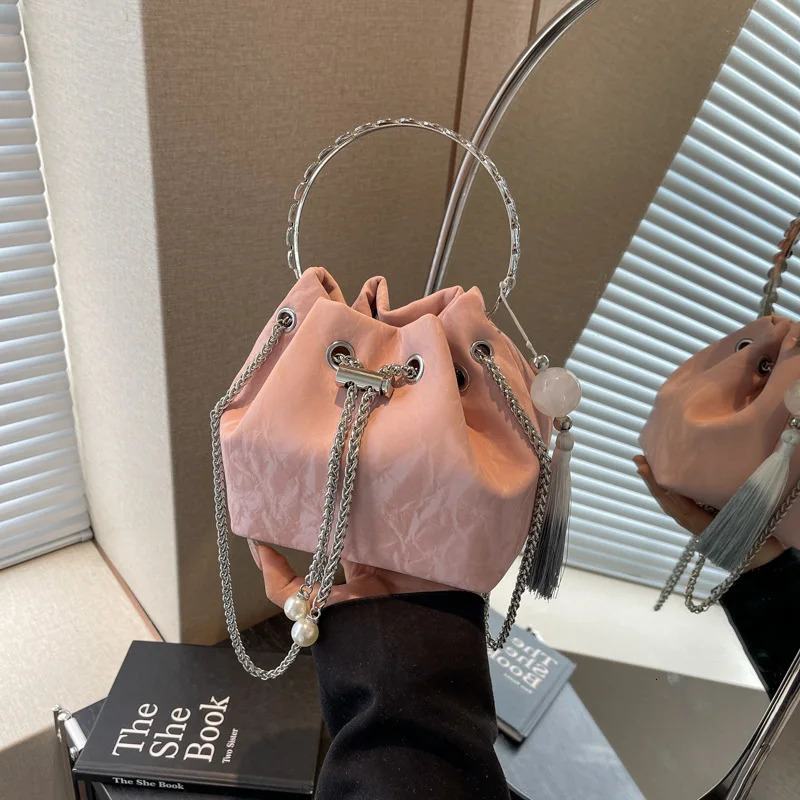 Korean handbag 100 chain shoulder bag cross body bag fashionable womens bucket bag pendant decorative PU material 250427