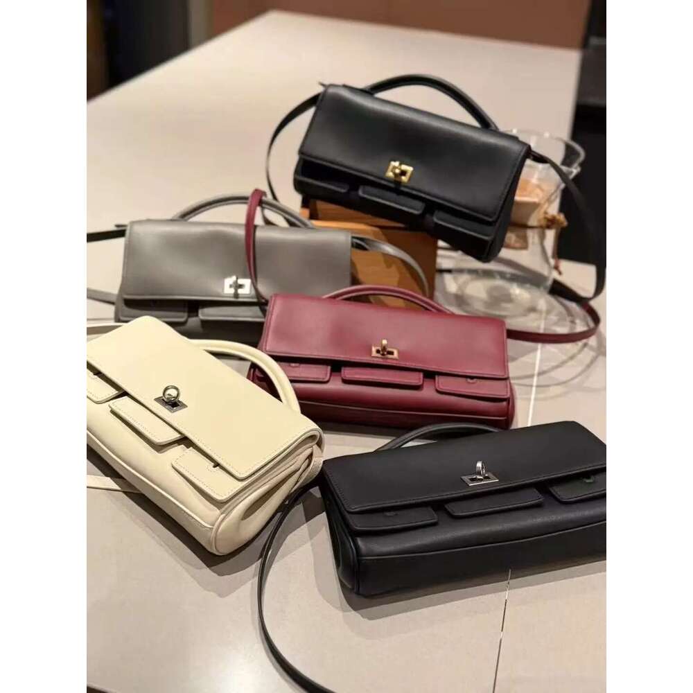 Genuine leather handbag 2025 new niche design lock small square vintage motorcycle style cowhide one-shoulder crossbody bag