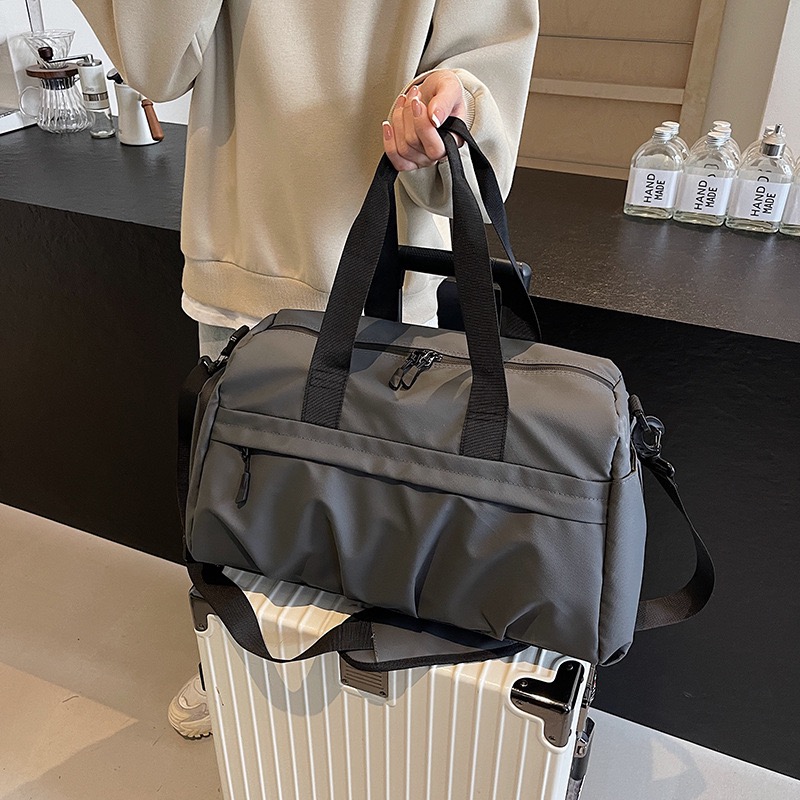 Tote waterproof sports bag, men and women business trip can be crossbody backpack, large capacity long and short distance luggage bag.